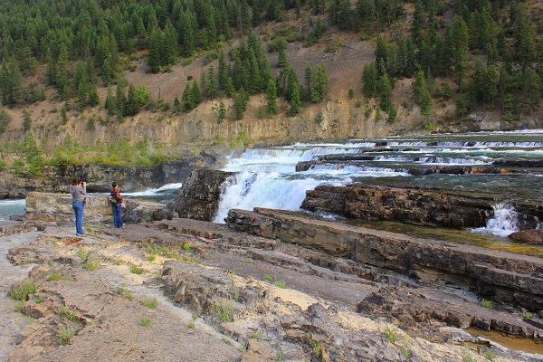 girls on rocks at Kootenai Falls