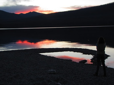 The sun sets on Lake McDonald.