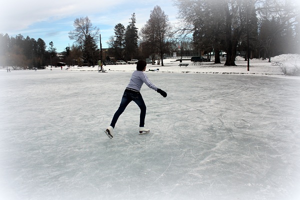 Eileen skating on Woodland Pond, Kalispell, Montana